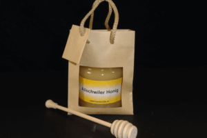 Minitragtasche mit 500gr Honig und Honiglöffel